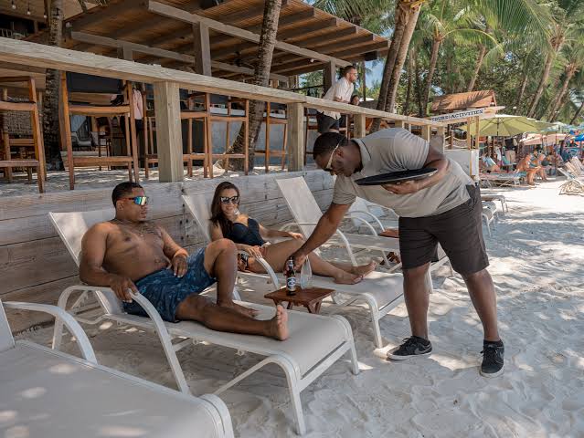 Tourists enjoying on beach